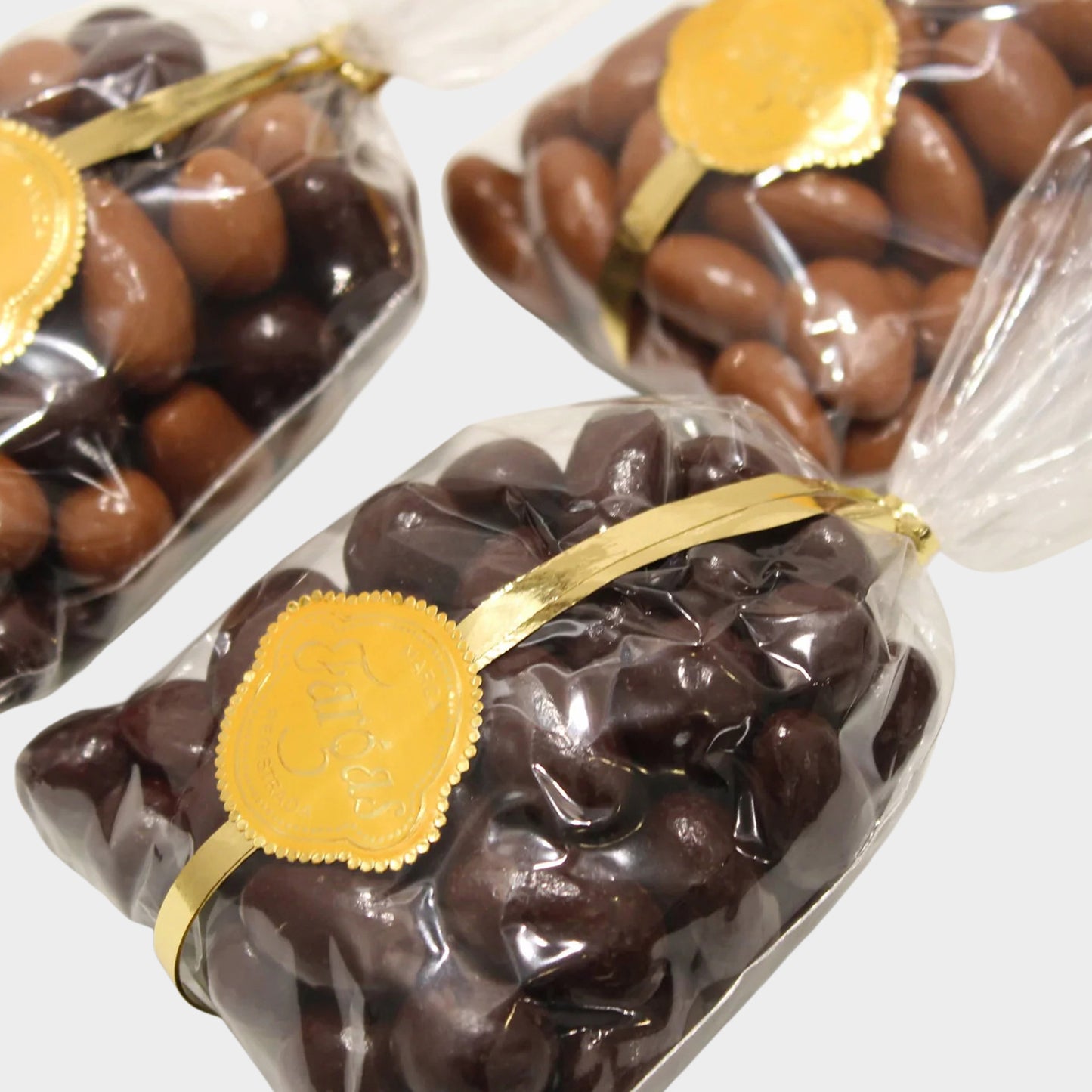 Bolsa suiza (almendras y avellanas bañadas con chocolate negro o chocolate con leche)